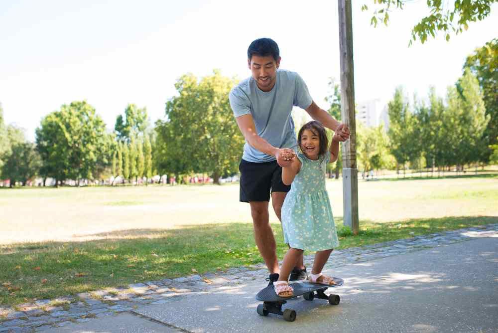 A parent is playing with his kid